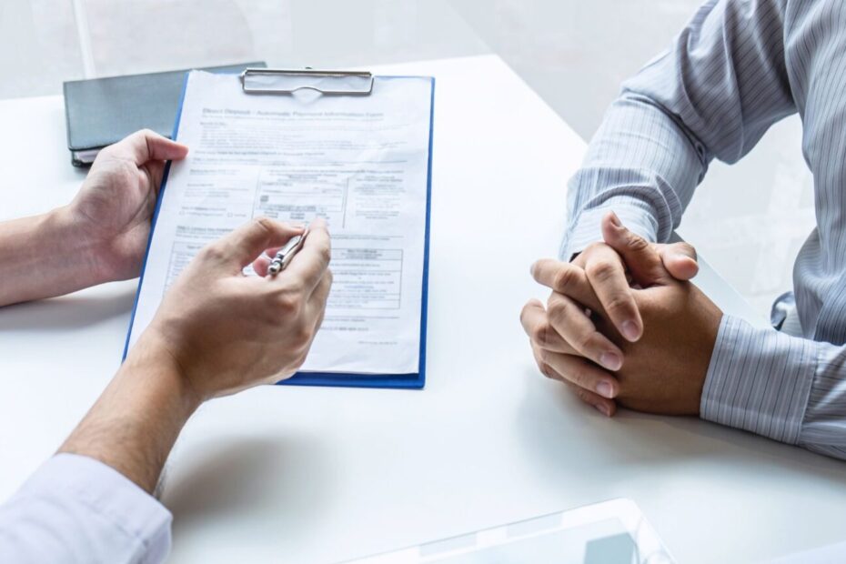 Doctor Writing Prescription For Patient