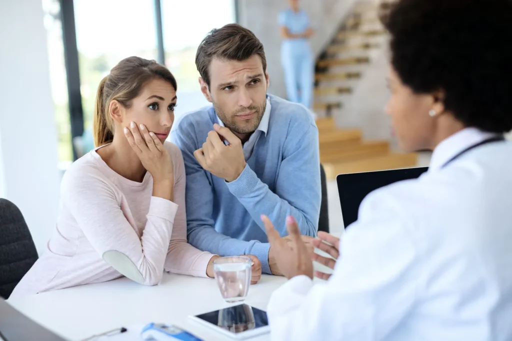 Doctor Consulting Couple About Xanax Tapering