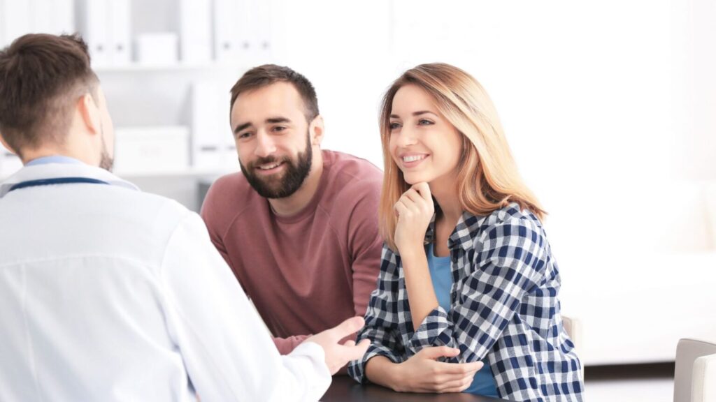 Doctor Discussing Treatment Plan With Couple