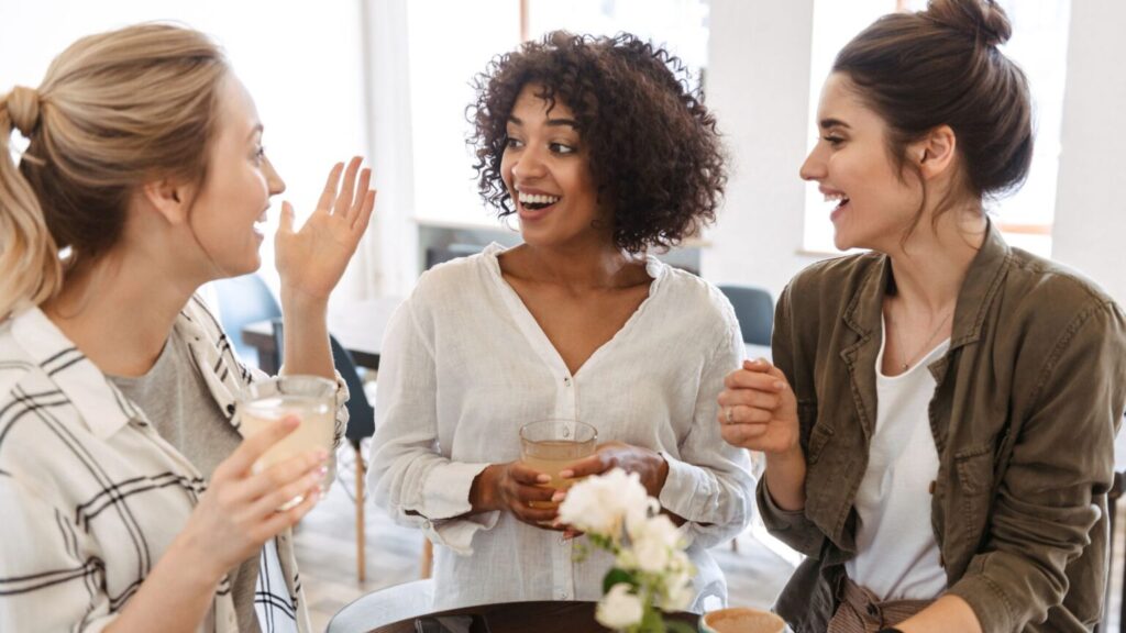Women Talking And Laughing Together