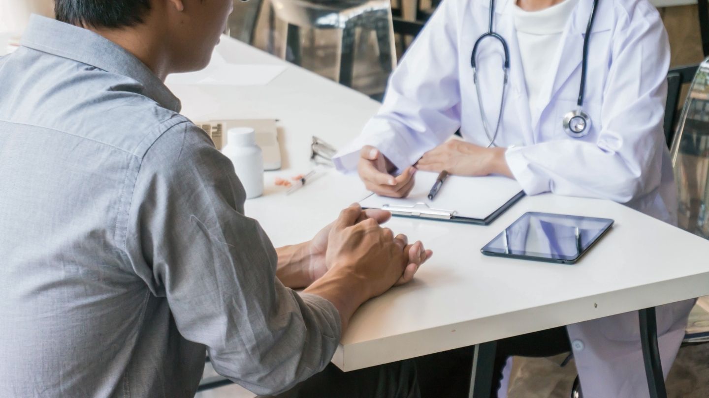 Physician consulting with a patient about a benzodiazepine tapering plan