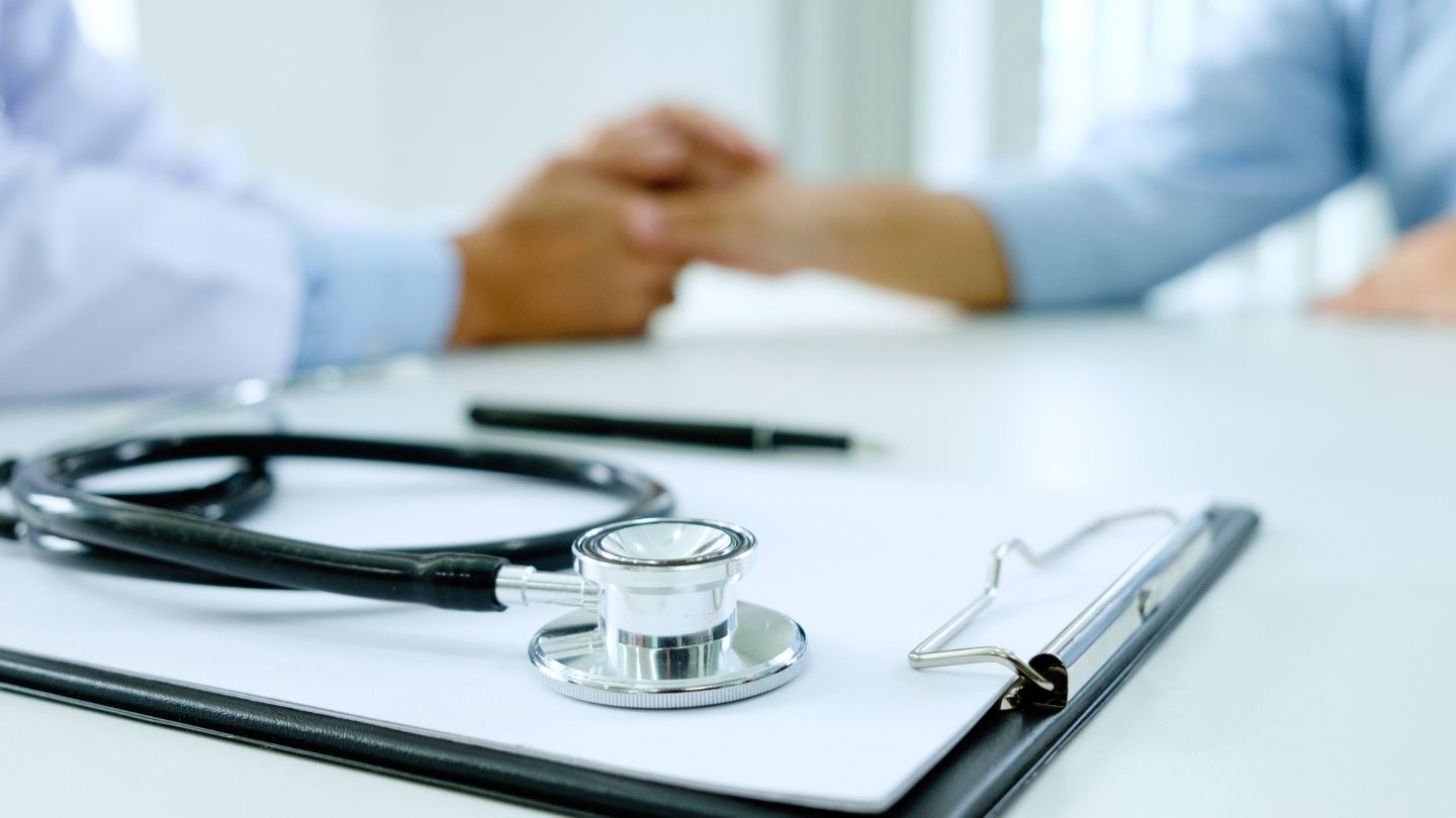 Physician reviewing a gradual tapering plan with a patient