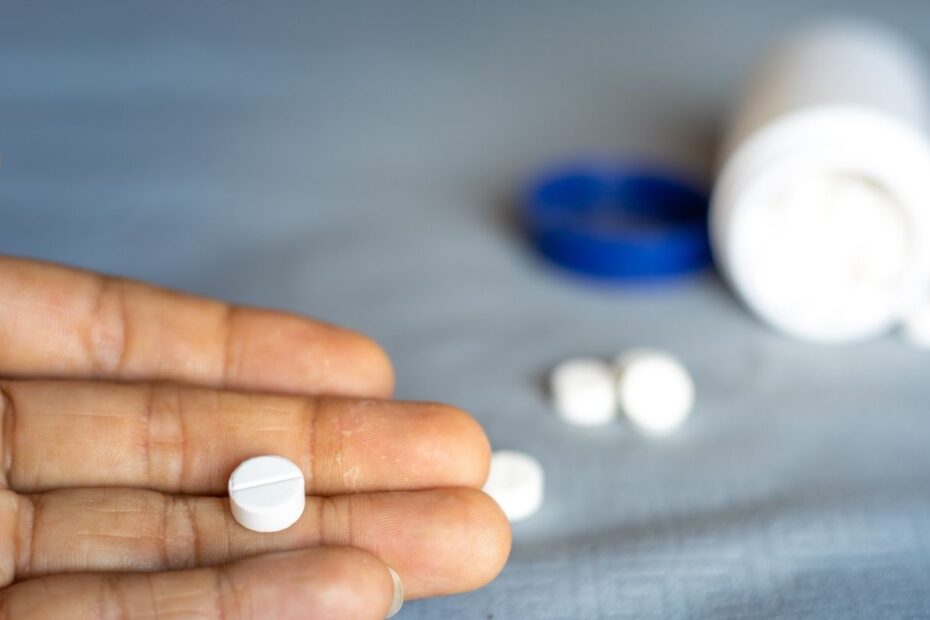 Patient Holding Ativan Pill During Withdrawal Taper