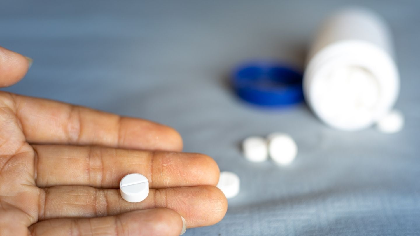 Patient Holding Ativan Pill During Withdrawal Taper